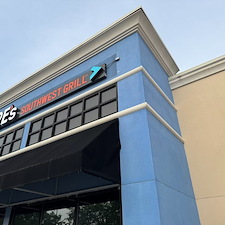 Building-Washing-and-Window-cleaning-at-Moes-Southwest-Grill-in-Pensacola-Florida-Cordova-Mall-for-the-new-remodel-of-the-restaraunt 0